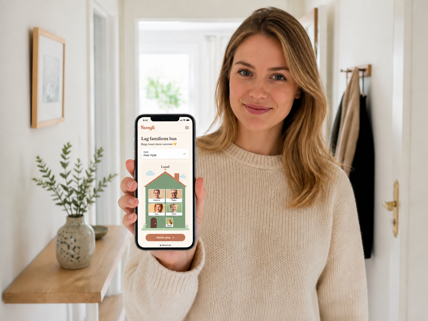 Forelder bygger familiens hus i Famyli på mobilen